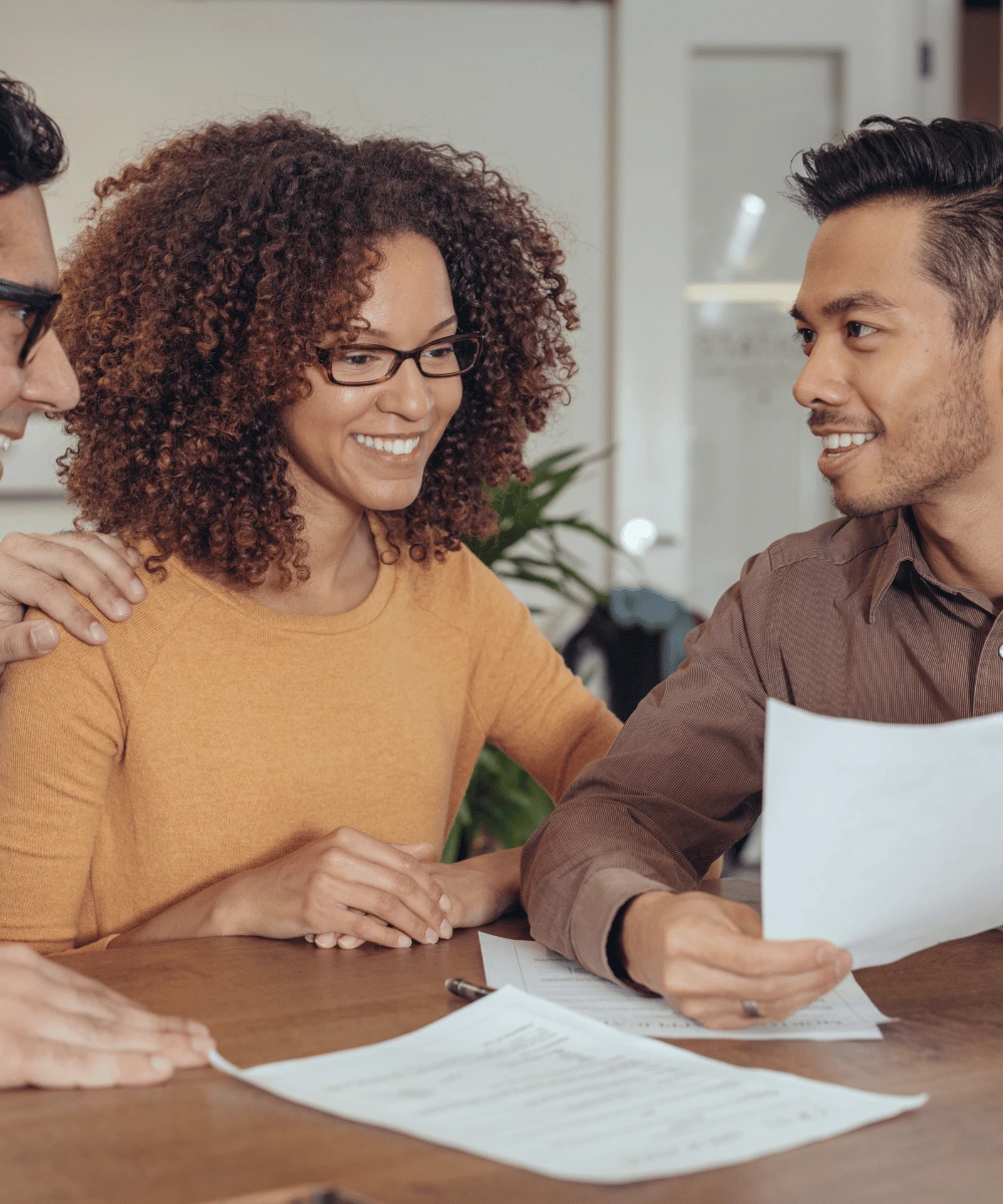 Homeowners reviewing their home loan refinancing options